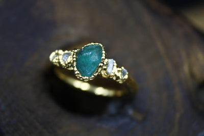 raw emerald alternative engagement ring rough diamond fox and stone